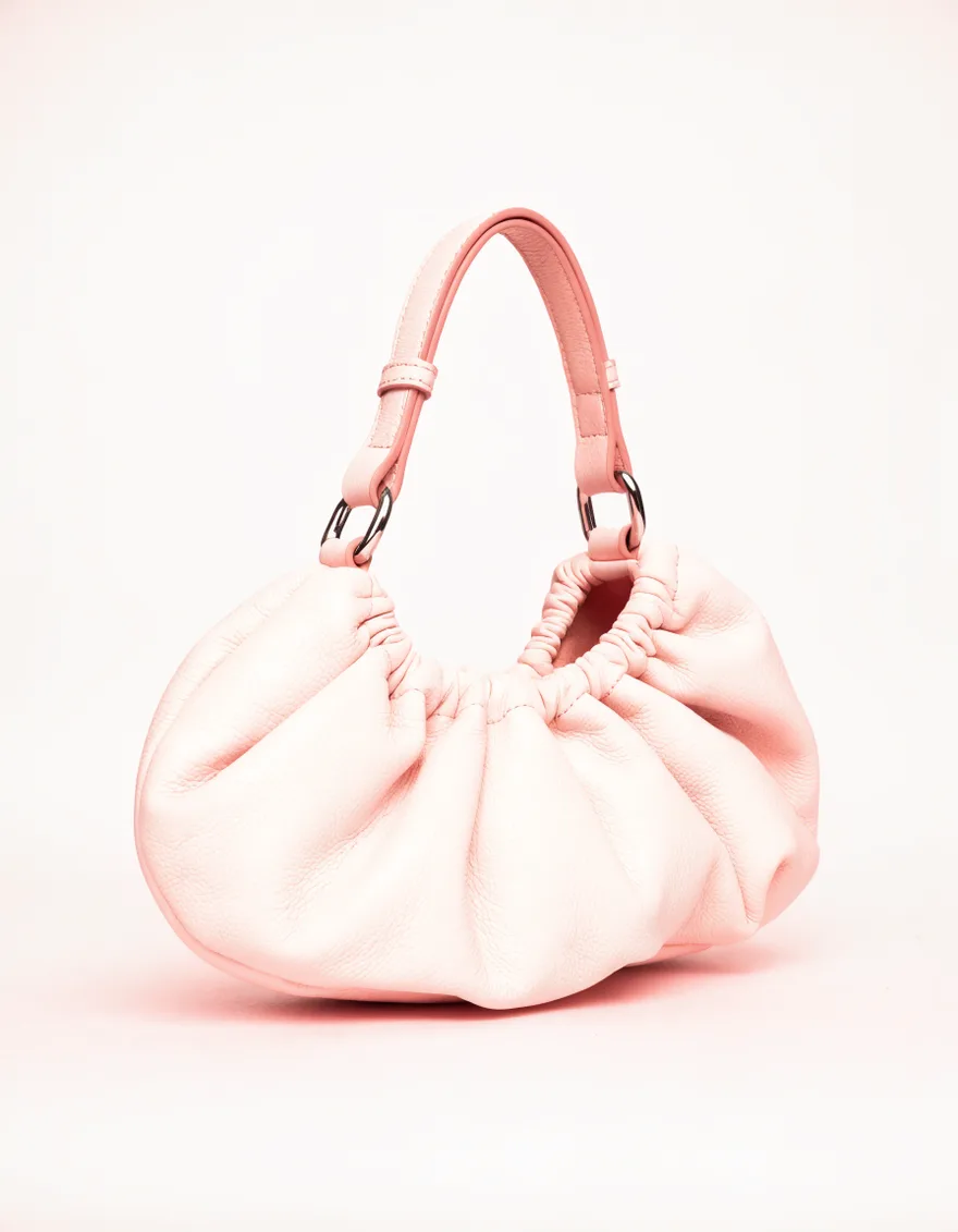 A blush pink leather shoulder bag